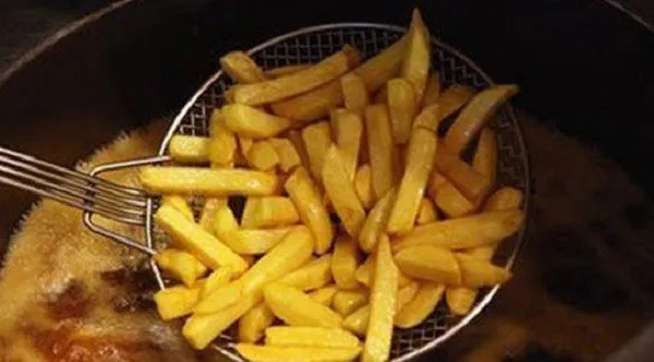 Frying potatoes in deep oil