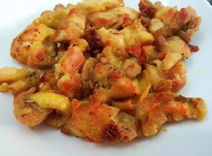 Frying the chicken until golden brown