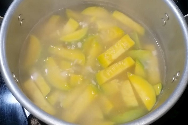 Cooking delicious pumpkin peanut soup