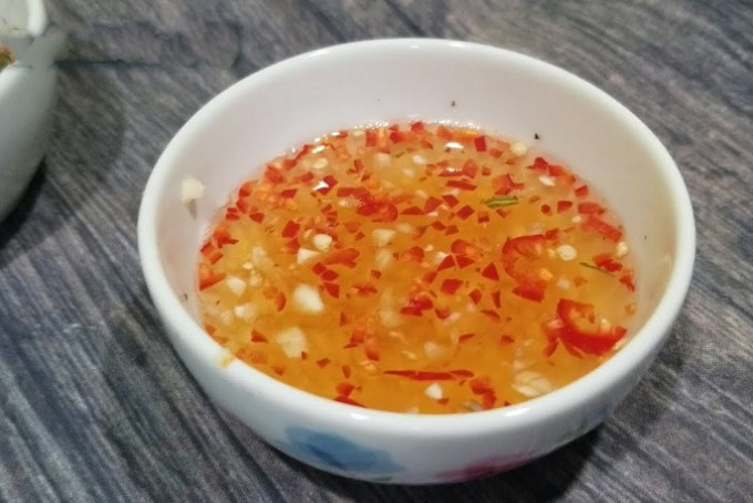 Preparing the dipping sauce for the salad