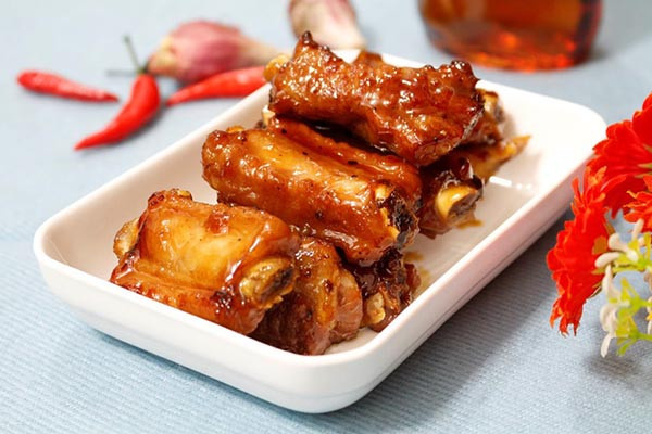 Honey-glazed ribs shining golden