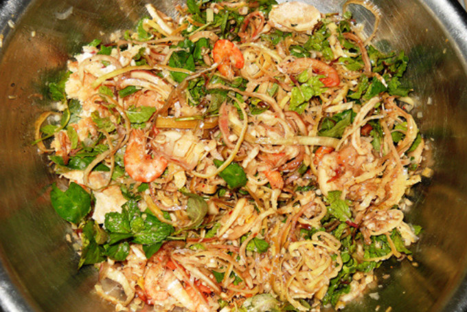 Mixing the banana blossom salad