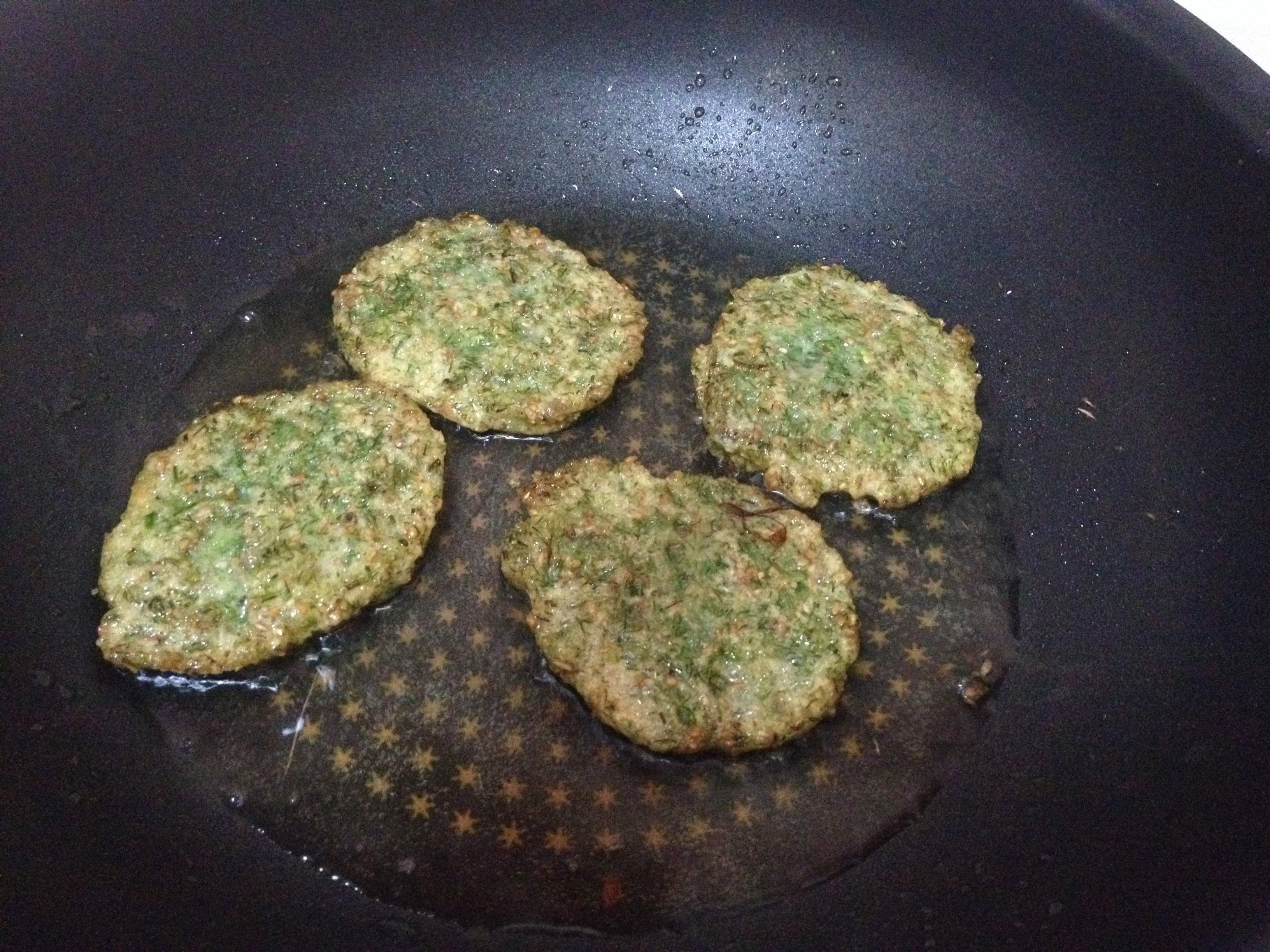 Mixing mung bean mixture with herbs