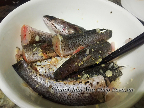 Marinating the fish before cooking