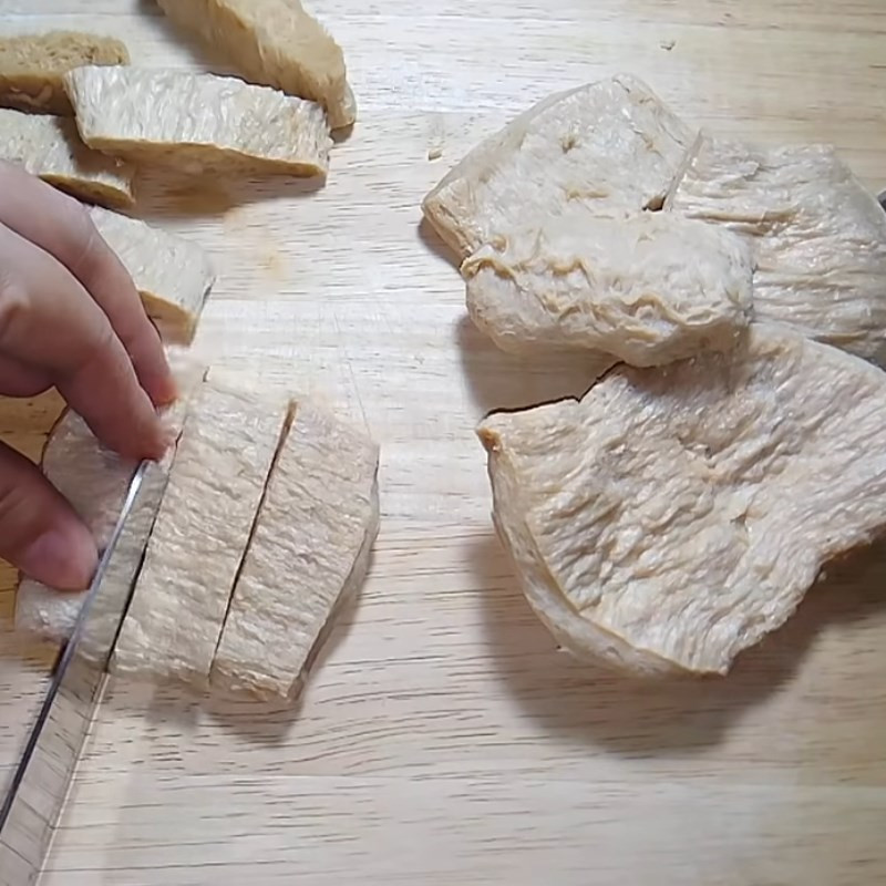Preparing ingredients like lemongrass, chili, and vegetarian ribs