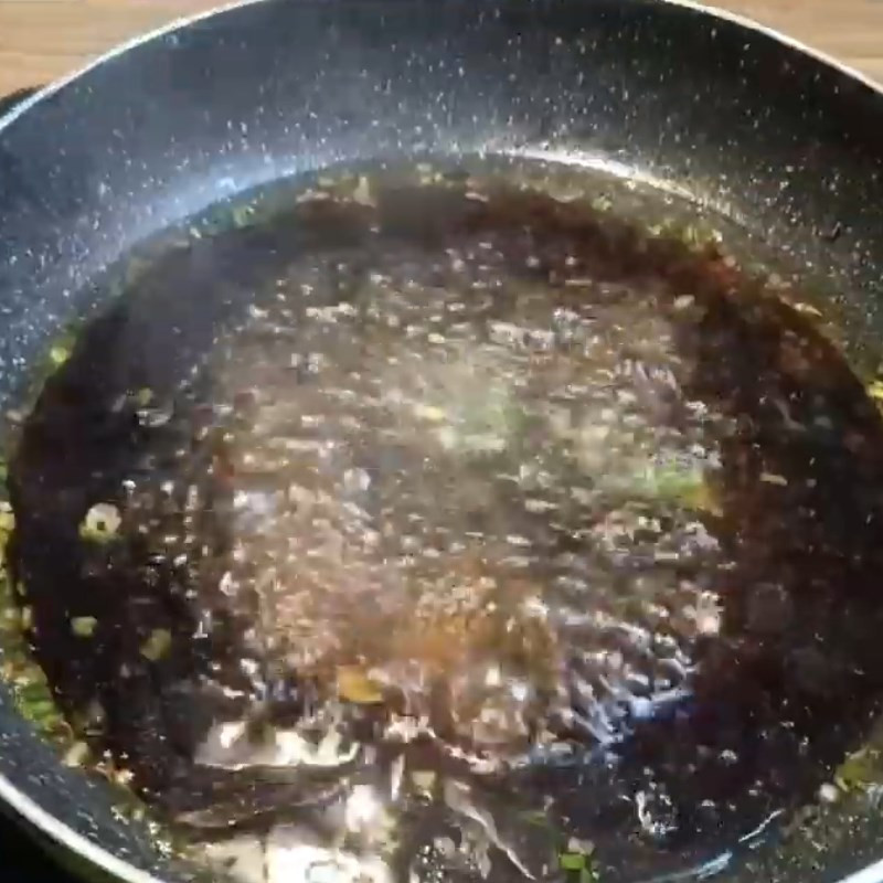 Making the savory braising sauce in a pan