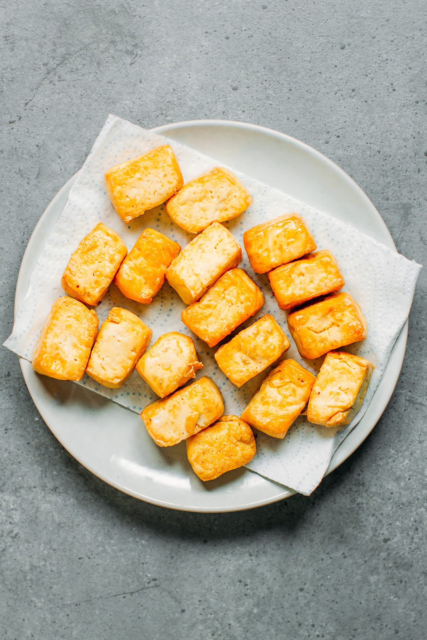 Fry the tofu until golden on all sides