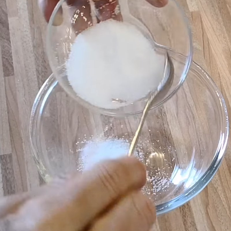 Mixing ingredients for the salad dressing in a small bowl