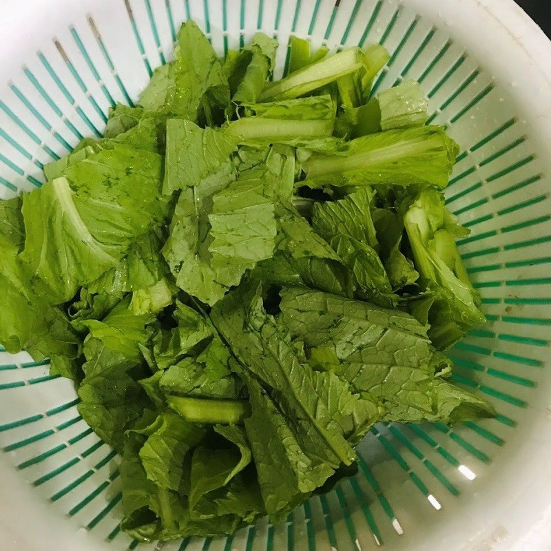 Preparing ingredients for pork and greens stir-fry