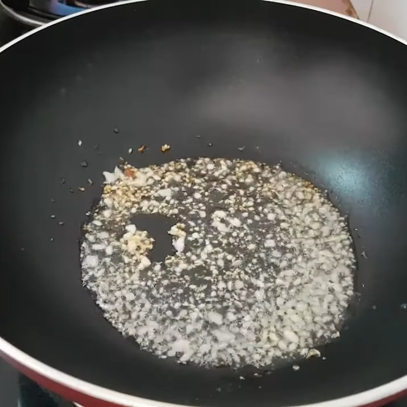 Stir-frying the mushrooms