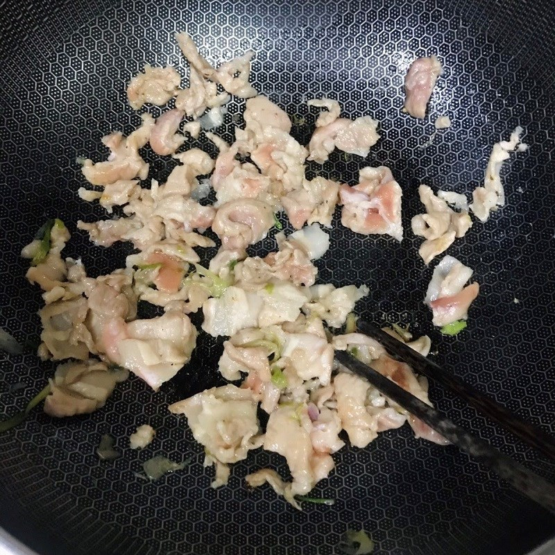 Stir-frying pork and greens