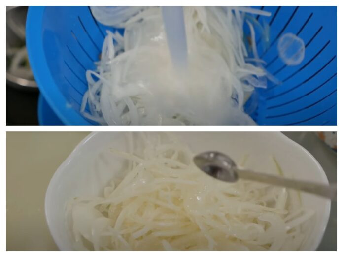 Seasoning sliced onion for the salad